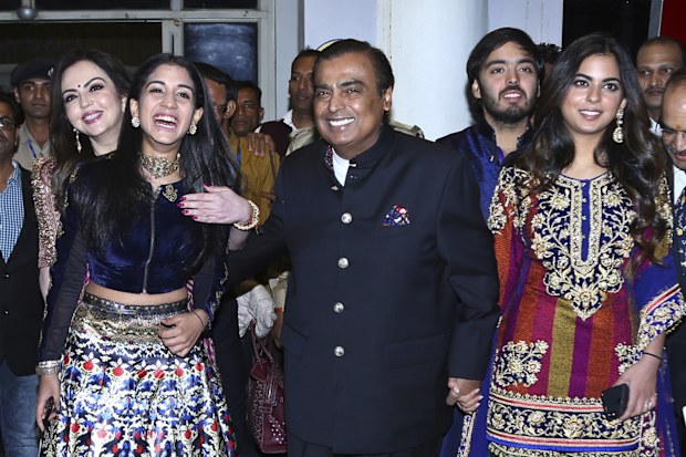 India's business tycoon Mukesh Ambani along with his wife Nita Ambani, daughter Isha Ambani and son Anant Ambani in 2018.