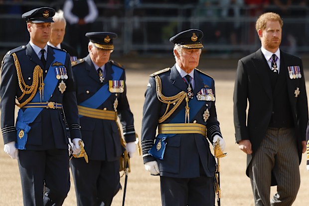 Prince William, Prince of Wales, King Charles III and Prince Harry, Duke of Sussex walk behind the coffin during the procession for the Lying-in State of Queen Elizabeth II on September 14, 2022 in London, England. Queen Elizabeth II's coffin is taken in procession on a Gun Carriage of The King's Troop Royal Horse Artillery from Buckingham Palace to Westminster Hall where she will lay in state until the early morning of her funeral. Queen Elizabeth II died at Balm