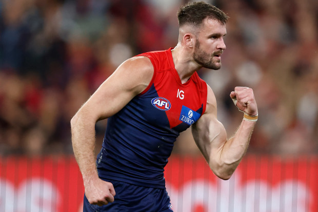 Joel Smith of the Demons celebrates a goal during the 2023 AFL first semi-final match between the Melbourne Demons and the Carlton Blues.