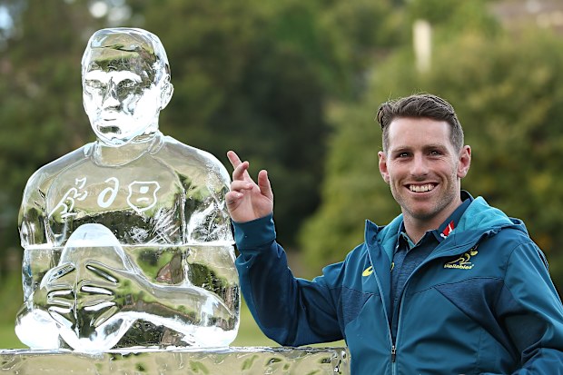 Bernard Foley with an 'Iceman' sculpture made in his honour.