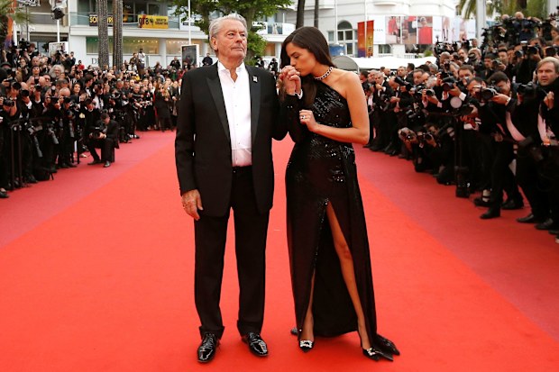 Alain Delon poses with his daughter Anouchka on the red carpet of the 72nd Cannes Film Festival in 2019