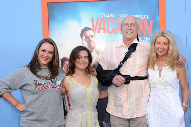 Emily Evelyn Chase, Caley Leigh Chase, Chevy Chase and Jayni Chase arrive at the Premiere Of Warner Bros. 'Vacation' at Regency Village Theatre on July 27, 2015 in Westwood, California.