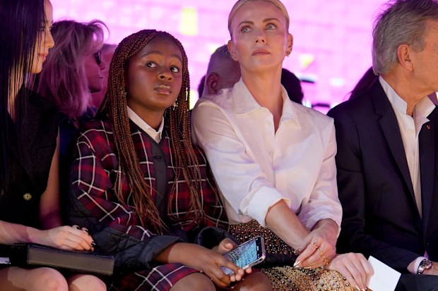 Charlize Theron and daughter Jackson at Paris Fashion Week.