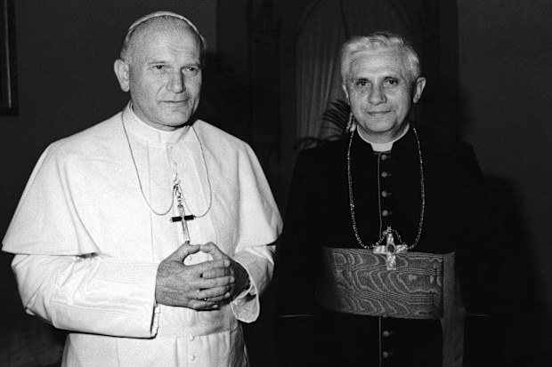 Pope John Paul II, left, stands next to German Cardinal Joseph Ratzinger at the Vatican in 1979. Ratzinger went on to become Pope Benedict XVI.