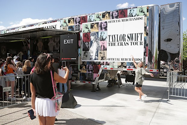 GLENDALE, ARIZONA - MARCH 17: Fans arrive at State Farm Stadium for the opening night of Taylor Swift's "The Eras" Tour on March 17, 2023 in Glendale, Arizona. (Photo by John Medina/Getty Images)