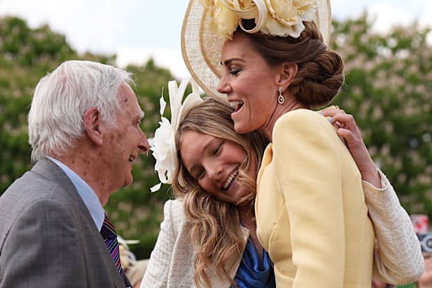 Britain's Kate, Princess of Wales, right, talks to Holocaust survivor Steven Frank at a Royal Garden Party at Buckingham Palace, London, Tuesday, May 20, 2025. (Aaron Chown/PA via AP)