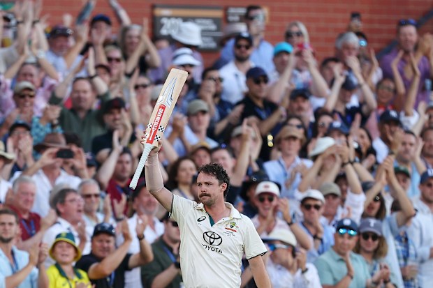 Travis head salutes the Adelaide crowd after his 140 during day two.