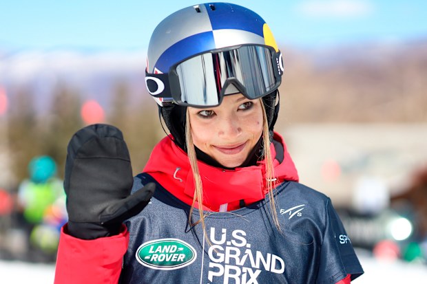 China's Eileen Gu waves to the camera after competing in the women's halfpipe skiing qualifiers of the U.S. Grand Prix and World Cup last March.