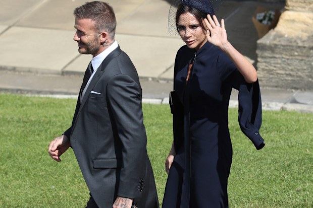 David and Victoria Beckham arrive for the wedding ceremony of Prince Harry and Meghan Markle at St. George's Chapel in Windsor Castle in Windsor, near London, England, Saturday, May 19, 2018. (Andrew Milligan/pool photo via AP)