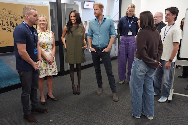 MELBOURNE, AUSTRALIA - APRIL 16: Meghan, Duchess of Sussex, and Prince Harry, Duke of Sussex meet staff members and young advocates during a visit to Batyr, a mental health engagement programme, at Swinburne University of Technology in Hawthorn on day three of the royal trip on April 16, 2026 in Melbourne, Australia. The Scar Tree Walk is a journey connecting traditional and contemporary Aboriginal cultures and histories of the Kulin Nation. The royal couple are on a four-day visit to Australia,