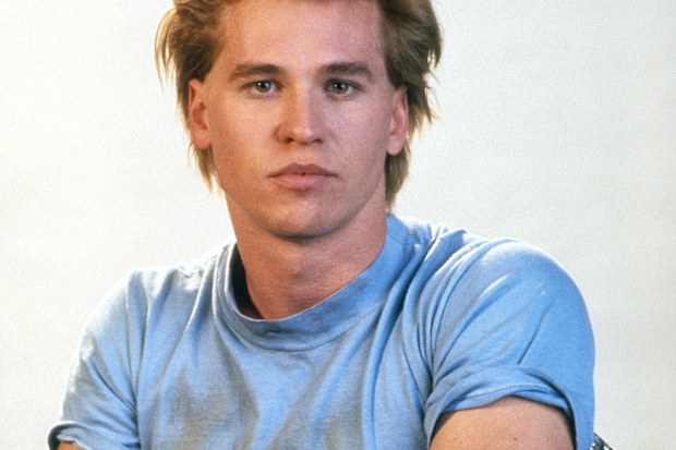 Val Kilmer poses for the Tri Star Pictures movie Real Genius in 1985. 