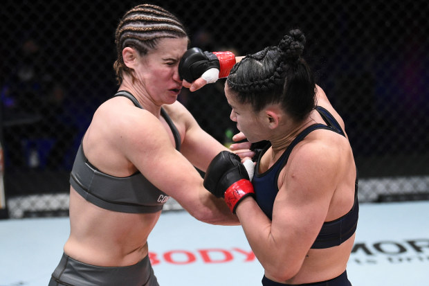Chelsea Hackett lands a punch on Victoria Leonardo in their women's flyweight bout during Dana White's Contender Series in 2020.