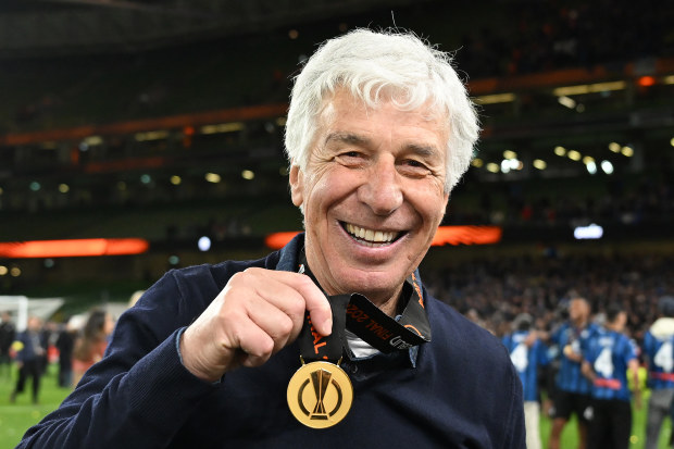 Gian Piero Gasperini of Atalanta poses for a photograph with his winners medal.