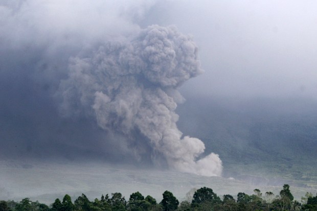 Pyroclastic flow rolls down the slope of Mount Semeru during an eruption in Lumajang, East java, Indonesia.