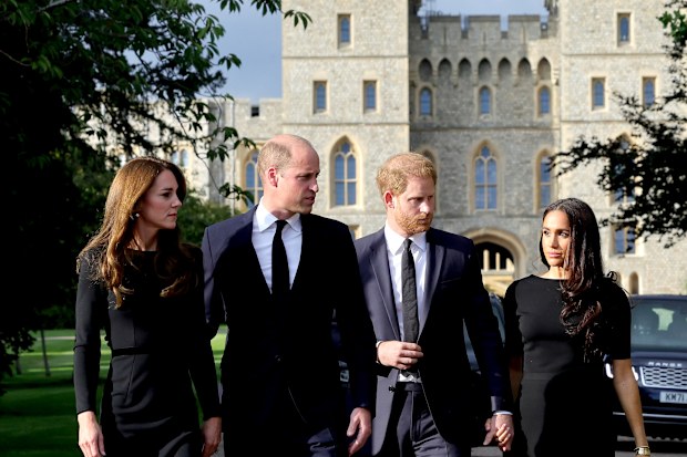 Catherine, Princess of Wales, Prince William, Prince of Wales, Prince Harry, Duke of Sussex, and Meghan, Duchess of Sussex on the long Walk at Windsor Castle arrive to view flowers and tributes to HM Queen Elizabeth on September 10, 2022 in Windsor, England. Crowds have gathered and tributes left at the gates of Windsor Castle to Queen Elizabeth II, who died at Balmoral Castle on 8 September, 2022. (Photo by Chris Jackson - WPA Pool/Getty Images)