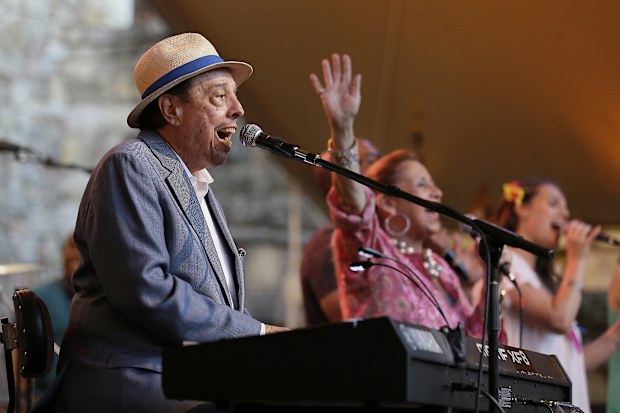 FILE - Sergio Mendes performs with his wife, Gracinha Leporace, center, at the Castello di Amorosa in Calistoga, Calif., on Wednesday, July 20, 2016, as part of the Festival Napa Valley. (AP Photo/Eric Risberg, File)