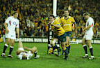 Jeremy Paul celebrates after scoring a try.