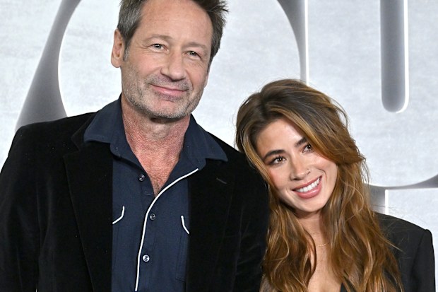 David Duchovny and Monique Pendleberry attend the Los Angeles Premiere of Netflix's You People at Regency Village Theatre on January 17, 2023 in Los Angeles, California.