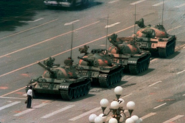 FILE - In this June 5, 1989 file photo, a man stands alone to block a line of tanks heading east on Beijing's Cangan Blvd. in Tiananmen Square.   Microsoft Corp. blamed accidental human error for its Bing search engine briefly not showing image results for the search term tank man on the anniversary of the bloody military crackdown in Beijings Tiananmen Square in 1989. Users in different parts of the world, including the U.S., said Friday, June 4, 2021 that no image results were returned when th