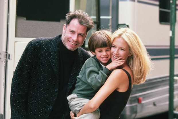 Actress Kelly Preston gets a visit from husband John Travolta and son Jett while on location filming the 1997 motion picture Addicted to Love
