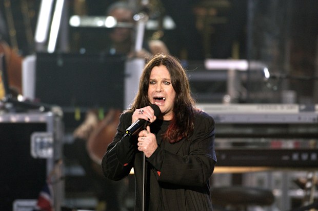 LONDON, UNITED KINGDOM - JUNE 03:  For The First Time In Her 50 Year Reign Queen Elizabeth II Held A Pop Concert - "party At The Palace"  - In Her Garden At Buckingham Palace.  Rock Singer Ozzy Osbourne Made The Journey From His Home In America To Entertain 12,000  Guests In The Garden, A Crowd Of Almost A Million In The Mall In Front Of The Palace Who Watched The Concert On Giant Screens And Millions Watching The Broadcast Around The World.  (Photo by Tim Graham Photo Library via Getty Images)