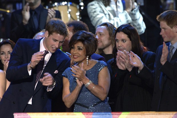 LONDON, UNITED KINGDOM - JUNE 03:  To Celebrate Her Golden Jubilee The Queen Is Hosting "party At The Palace", A Unique Pop Concert Held In The Grounds Of Buckingham Palace For 12,500 Guests.  Prince William Talking To Singers Shirley Bassey And Ozzy Osbourne When He And His Brother Prince Harry, Join Them And Other Performers On Stage At The End Of The Concert.  (Photo by Tim Graham Photo Library via Getty Images)