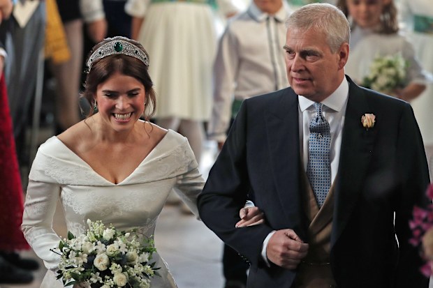 WINDSOR, ENGLAND - OCTOBER 12: Princess Eugenie walks down the aisle with her father, Prince Andrew, the Duke of York, for her wedding to Jack Brooksbank at St George's Chapel in Windsor Castle on October 12, 2018 in Windsor, England. (Photo by Yui Mok - WPA Pool/Getty Images)