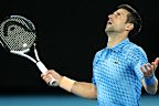 Novak Djokovic of Serbia reacts in his round one singles match against Roberto Carballes Baena.