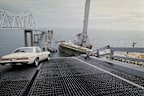 FILE - A car is halted at the edge of the Sunshine Skyway Bridge across Tampa Bay, Fla., after the freighter Summit Venture struck the bridge during a thunderstorm and tore away a large part of the span, May 9 1980.  A container ship struck a major bridge in Baltimore early Tuesday, March 26, 2024,  causing it to plunge into the river below. From 1960 to 2015, there have been 35 major bridge collapses worldwide due to ship or barge collision.   (AP Photo/Jackie Green, File)