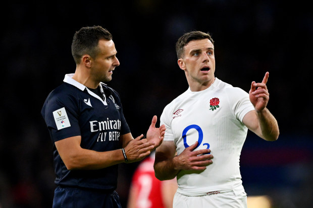 Referee James Doleman (left) talks to George Ford during the Six Nations match between England and Wales at Twickenham.