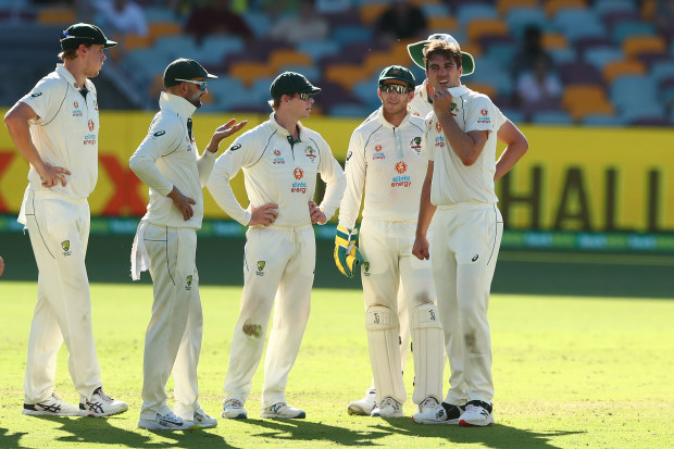 Australia players watch a review during a Test.
