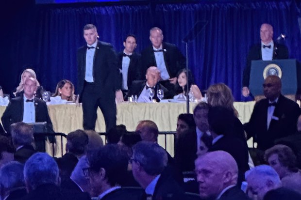 US Secret Service agents surround President Donald Trump.