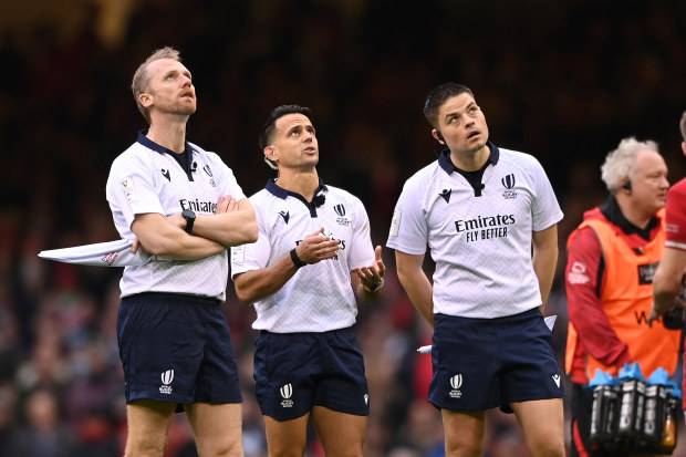 Wayne Barnes (from left) Nic Berry, and Chris Busby make a decision whilst looking at the TMO during the Six Nations.