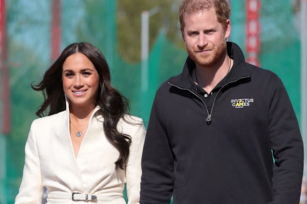 Prince Harry, Duke of Sussex and Meghan, Duchess of Sussex attend the Athletics Competition during day two of the Invictus Games The Hague 2020 at Zuiderpark on April 17, 2022 in The Hague, Netherlands. (Photo by Chris Jackson/Getty Images for the Invictus Games Foundation)