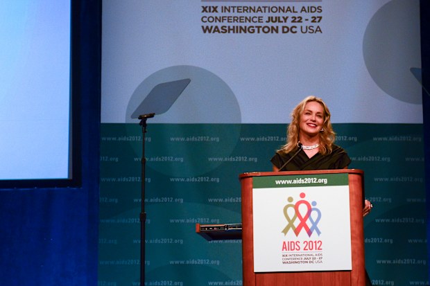 Sharon Stone speaks as she presents the inaugural Elizabeth Taylor Award to brothers Dr. Kamiar Alaei and Dr. Arash Alaei,at  the opening day of the AIDS 2012 - XIX International AIDS Conference at the Walter E. Washington Convention Center on July 22, 2012 in Washington, DC. 