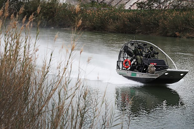 Border Patrol agents patrol the Rio Grande