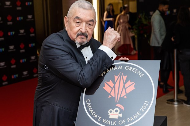TORONTO, ONTARIO - DECEMBER 03: Graham Greene attends the unveiling of his Canadas Walk of Fame 2021 commemorative plaque for Arts & Entertainment during the 2022 Canada's Walk of Fame Gala at Beanfield Centre, Exhibition Place on December 03, 2022 in Toronto, Ontario. (Photo by Mathew Tsang/Getty Images)