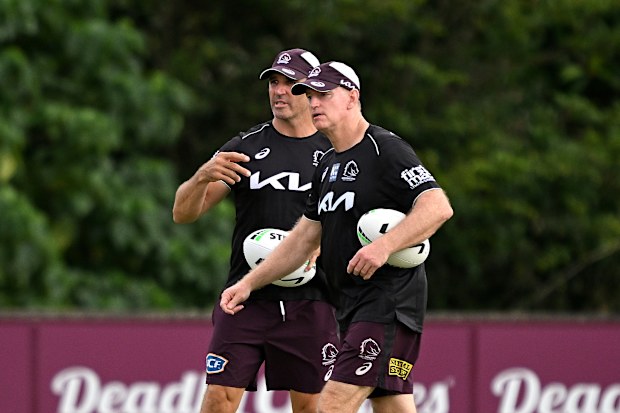 Broncos coach Michael Maguire and assistant Trent Barrett.