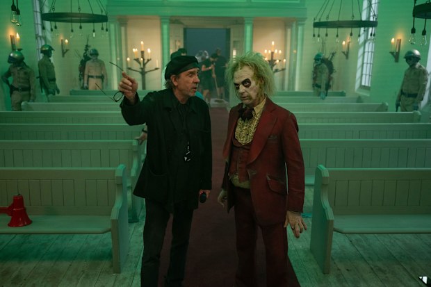 (From left) Director Tim Burton and Michael Keaton on the 'Beetlejuice Beetljuice' set. Geffen/Warner Bros/Kobal/Shutterstock via CNN Newsource