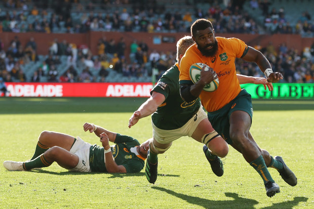 Marika Koroibete of the Wallabies makes a break to score a try during The Rugby Championship match between the Australian Wallabies and the South African Springboks