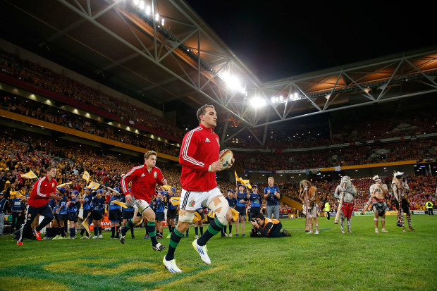 The British & Irish Lions run out onto Lang Park in 2013.