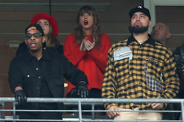 Cara Delevigne and Taylor Swift at the AFC Championship.