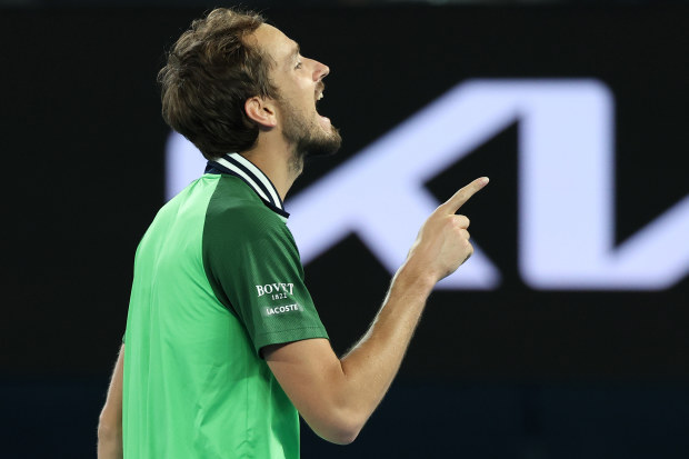 MELBOURNE, AUSTRALIA - JANUARY 26: Daniil Medvedev celebrates winning match point in their Semifinal singles match against Alexander Zverev of Germany during the 2024 Australian Open at Melbourne Park on January 26, 2024 in Melbourne, Australia. (Photo by Daniel Pockett/Getty Images)