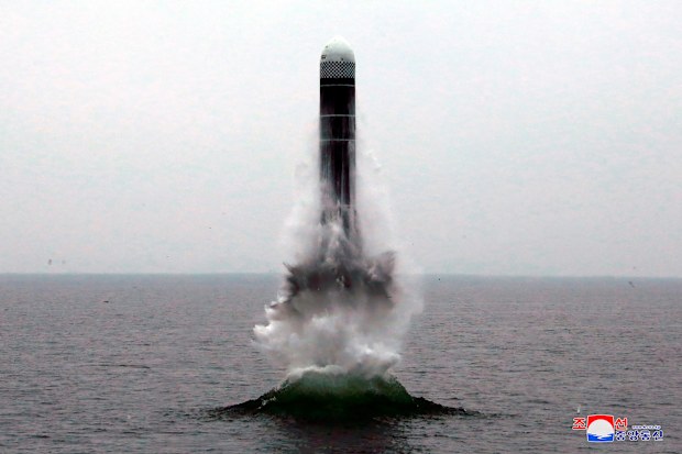 North Korea fired a ballistic missile from the sea on Wednesday, South Korea's military said, a suggestion that it may have tested an underwater-launched missile for the first time in three years ahead of a resumption of nuclear talks with the United States this weekend. (Korean Central News Agency/Korea News Service via AP)