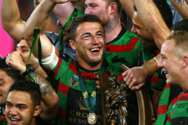 Sam Burgess celebrates with teammates after Souths grand final win. (Getty)