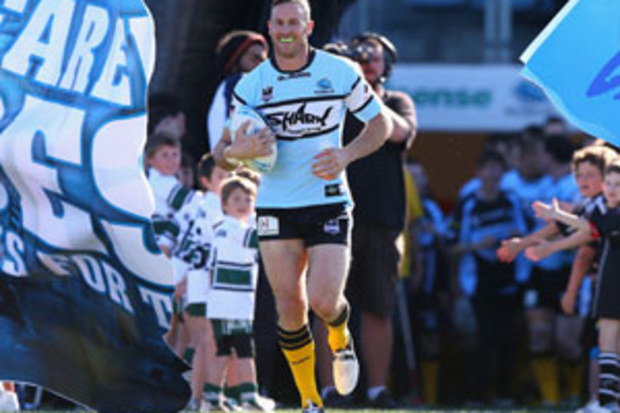 Colin Best runs out for his last game with the Sharks in 2012. (Getty)