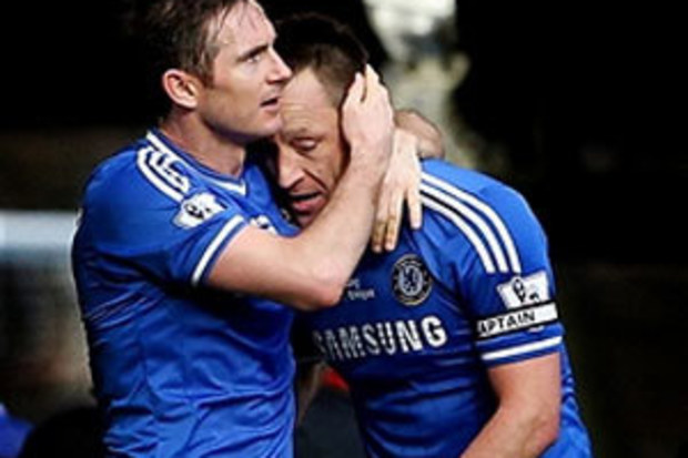 John Terry (R) is congratulated by Frank Lampard after scoring. (Getty)