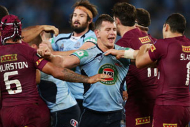 NSW and Queensland players tangle in Origin II. (Getty)