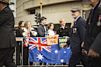 25/04/24 Spectators show their respects during the ANZAC Day march, Melbourne. Photograph by Chris Hopkins Crowds flocked to the streets to pay their respects.