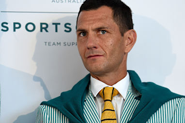 Kookaburra Jamie Dwyer looked dapper with tie and the green jumper drapped over his shoulders.